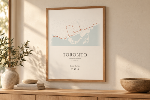 Illustrative room mockup of a Toronto Waterfront race print with fictional Jamie Taylor details.